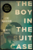 The boy in the suit case